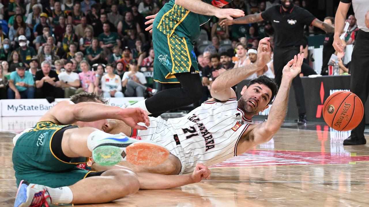 Todd Blanchfield of the Hawks competes for the ball on Friday night. Picture: Steve Bell/Getty Images.