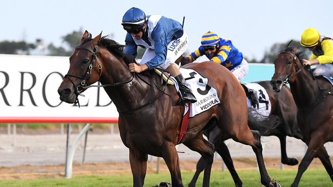 Jockey Joe Bowditch rides Viddora (left) to victory in the Magic Millions Snippets, during the Gold Coast Magic Millions at Aquis Park. Picture: Albert Perez, AAP Image.