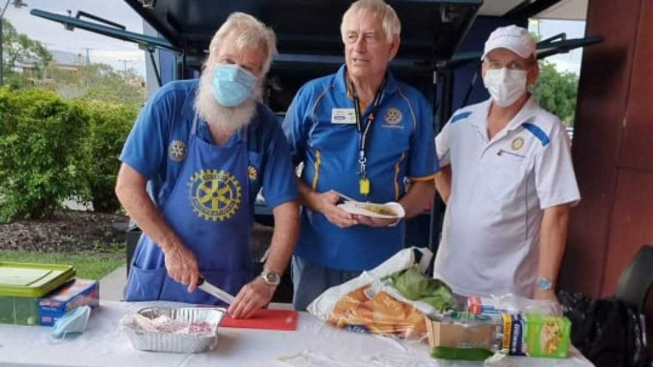 Feeding the city: Preparing Sunday dinner is Willy Paes, Ron McLean and Tom Hagan, Tom is from the Rotary Club of Maryborough City.