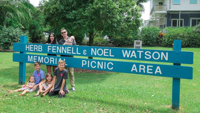 Tom and Jessica Watson with thier children at the picnic area dedicated to the memory of his dad Noel Watson, and Herb Fennell who died in the tragic Southport Honda fire Picture: Glenn Campbell