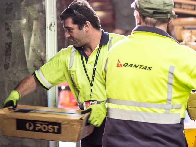 Qantas Freight loading cargo at Sydney Airport. Supplied