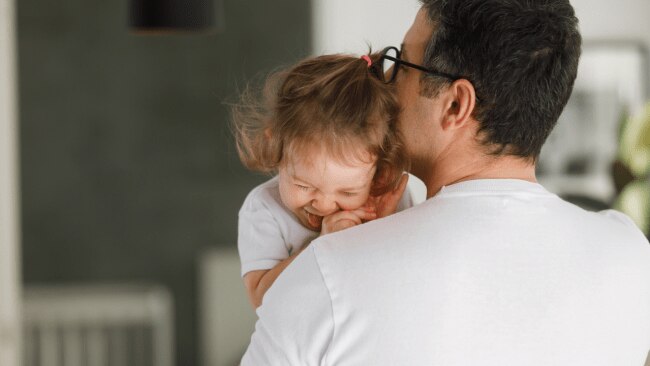 Father steps in to save his daughter from choking hazard. Source: iStock