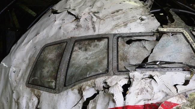 Tragic end ... a reconstructed section of the Malaysia Airlines plane that was downed by a missile over Ukraine, killing 298 people. Picture: AAP