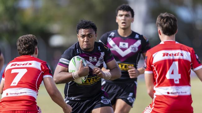 Marsden’s Sione Siulua powers through with the ball in their game against Palm Beach Currumbin State High during the Langer Trophy Match.