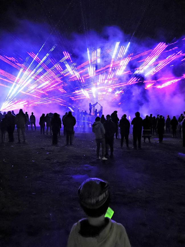 The skies of Tasmania’s East Coast will come alive with crisscrossing beams of colour and light for Bicheno Beams in July. Picture: Supplied