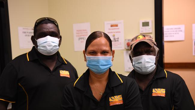 Manyallaluk staff Robert and Richard with Burunga staff Desley at Sunrise Aboriginal Health Corporation Burunga clinic. Picture: Amanda Parkinson