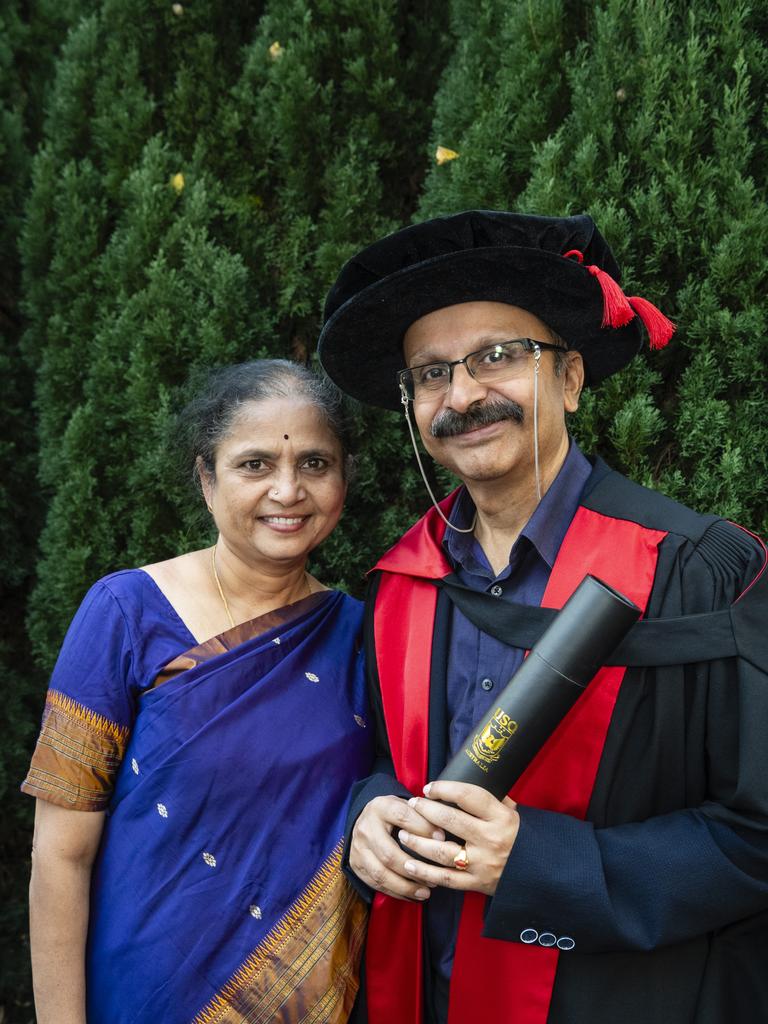 Doctor of Philosophy graduate Dr Murali Ramakrishnan with his wife Sharada Murali at a UniSQ graduation ceremony at Empire Theatres, Wednesday, June 28, 2023. Picture: Kevin Farmer