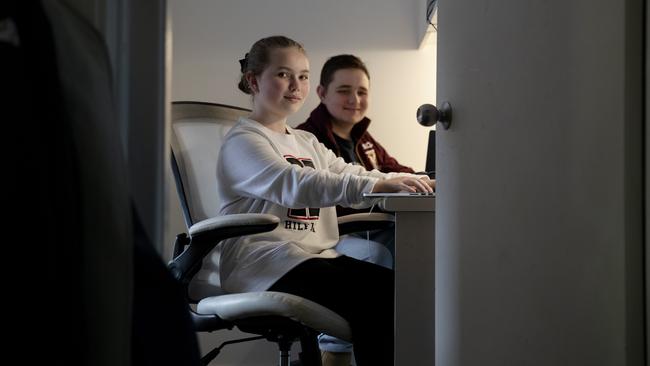 Ruby, 12, and Zach Jones, 14, homeschooling on Sydney’s northern beaches on Tuesday. Picture: Nikki Short