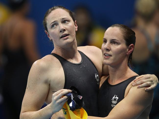 AustraliaÕs Cate Campbell with sister Bronte after finishing sixth and fourth in the WomenÕs 100m Freestyle Final on day six of the swimmingat the Rio 2016 Olympic Games. Picture. Brett Costello