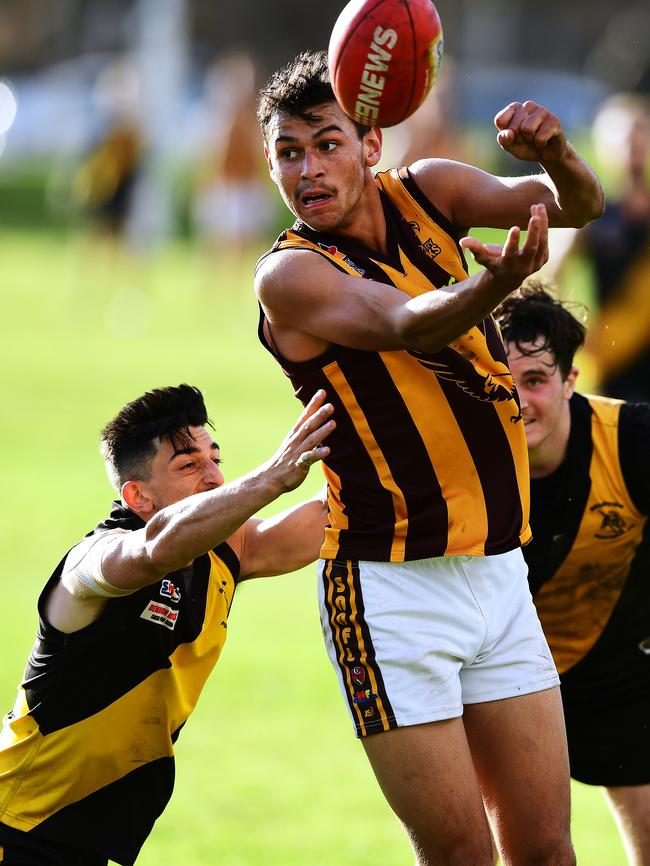 Modbury’s Daniel Kaipara gets a handball away against Broadview. Picture: APP/Mark Brake