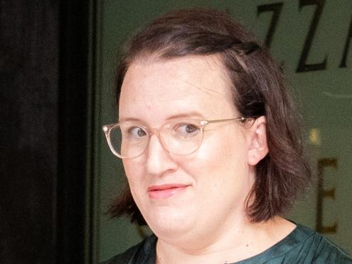 Lisa Baynes, 32, (green shirt) pleaded guilty to two counts of not registering as a health practitioner and claiming to be registered when she appeared in Downing Centre Local Court on January 25. She worked at Royal North Shore Hospital and Northern Beaches Hospital while unregistered. Picture: Thomas James Parrish