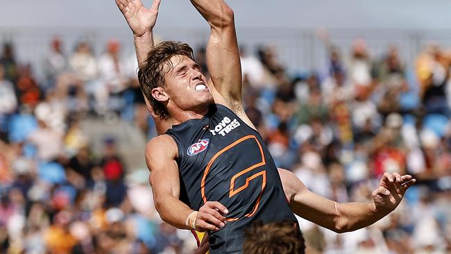 Giants Aaron Cadman taps during the AFL Gather Round match between the GWS Giants and Gold Coast Suns at Mount Barker, Adelaide on April 7, 2024.  Photo by Phil Hillyard(Image Supplied for Editorial Use only - **NO ON SALES** - Â©Phil Hillyard )