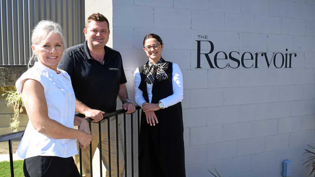 Century 21 Sales Associates Niki Meads with Principal and Marketing Agent Billy Mitchell and Aleisha Dodt at The Reservoir yesterday. Picture: Philippe Coquerand