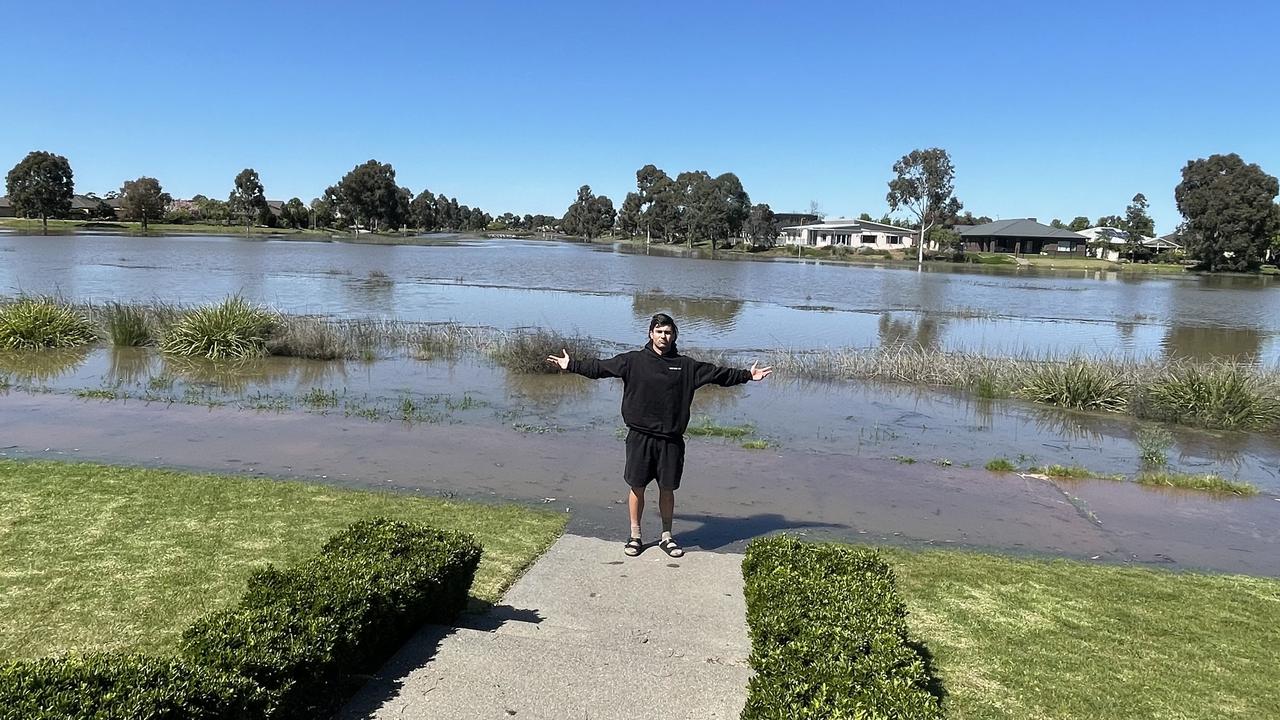 Josh Rachele outside his family home, where they were blocked in by flooded roads. Picture: Supplied