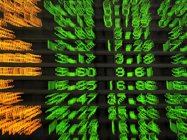 WIRE: This Australian Stock Exchange All Ordinaries board graphic shows company share prices in positive territory indicated by the green numbering, at the opening of trading in Sydney, 11/03/2009.