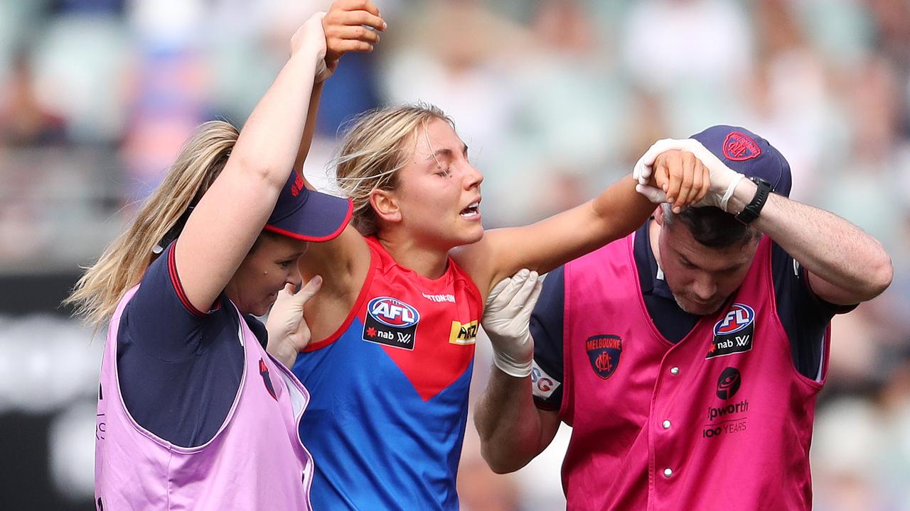 Eliza McNamara was ruled out of the game after her head clash with Randall. Picture: AFL Photos/Getty Images