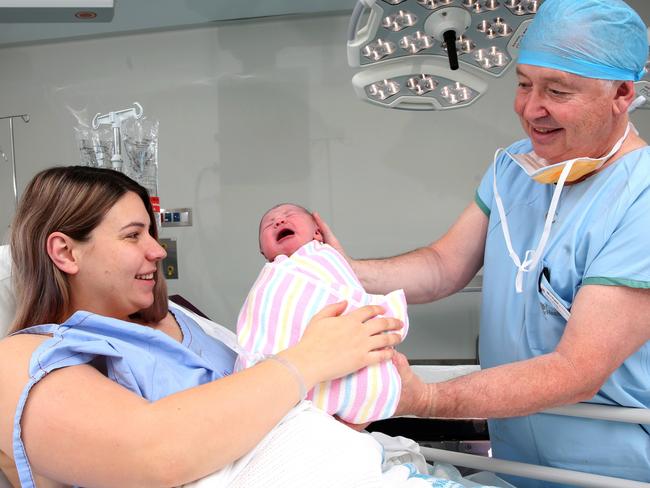 Professor Nicholl with new mum Madeleine Love and baby Alaska. Picture: Peter Kelly