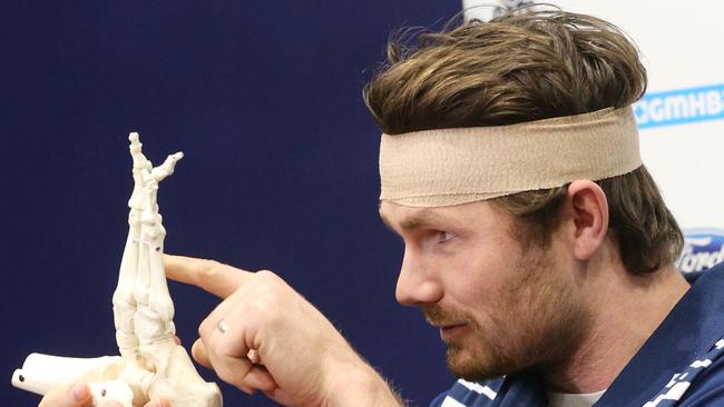 Geelong’s Patrick Dangerfield — hamming up his injuries during a press conference  — is a rare AFL player who offers personality in interviews Picture: Mark Wilson