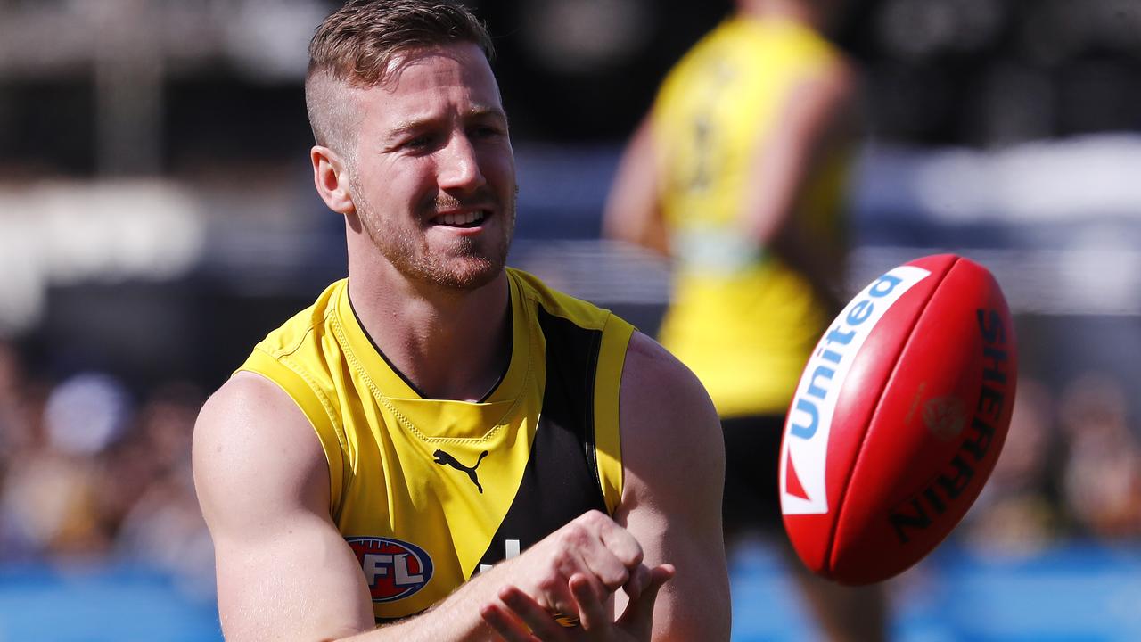 Kane Lambert handballs at Richmond training. Picture: Michael Klein