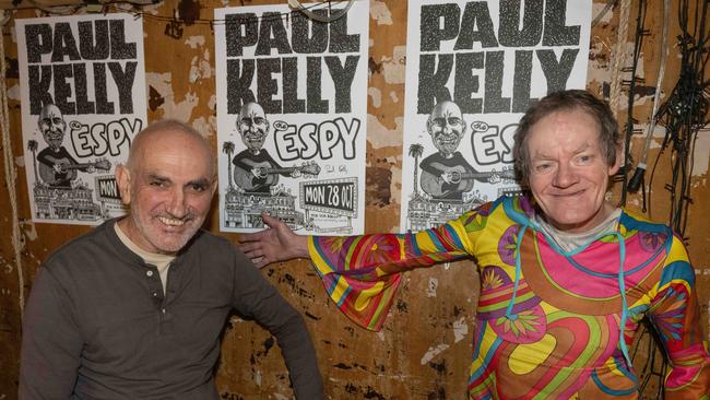 Paul Kelly with poster artist Fred Negro. Picture: Tony Gough