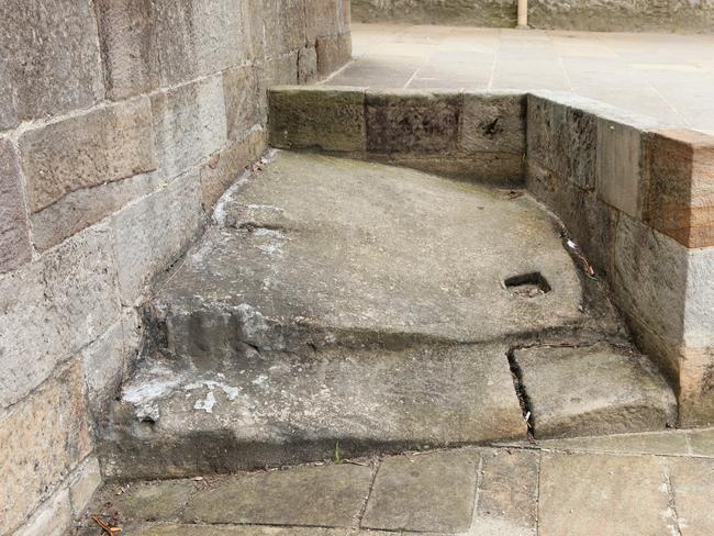 The sandstone ridge line that was at the edge of the harbour at Cadman's Cottage at Circular Quay.