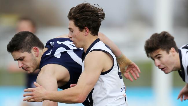 2018 Challenge Cup, AFL Vic Country Vs VAFA,  Under 19's,  Mars Stadium, Ballarat,   Lachlan Noble, 22, Vic Country  Under 19's, (white),  &   Luke Di Lizio, 24,  VAFA  Under 19's,   (blue), Picture Yuri Kouzmin