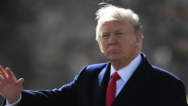 President Donald Trump waves as he leaves the White House in Washington. Picture: AP/Manuel Balce Ceneta