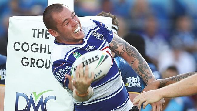 David Klemmer of the Bulldogs celebrates after scoring a try.