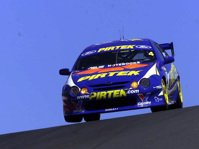 Marcos Ambrose, pictured racing his iconic Ford in 2001, is a two-time Supercars champion.