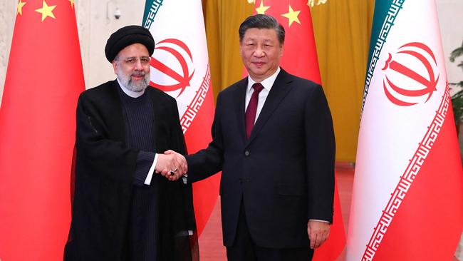 Chinese President Xi Jinping with the Iranian President Ebrahim Raisi. Picture: AFP