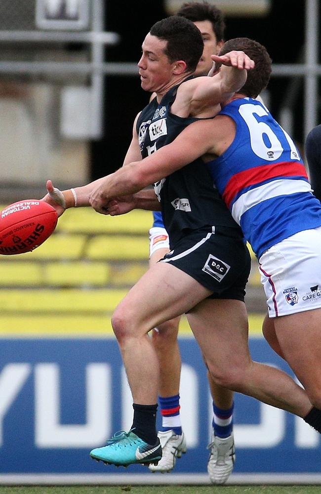 Tom Wilson puts his body on the line against Footscray this year. Picture: Hamish Blair