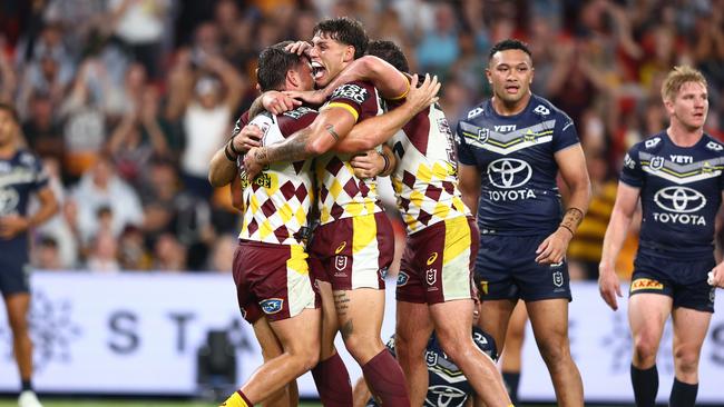 BRISBANE, AUSTRALIA – MARCH 29: Tyson Smoothy of the Broncos celebrates a try during the round four NRL match between Brisbane Broncos and North Queensland Cowboys at Suncorp Stadium, on March 29, 2024, in Brisbane, Australia. (Photo by Chris Hyde/Getty Images)