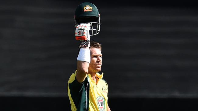 David Warner eacts after scoring 100 runs during the third ODI.