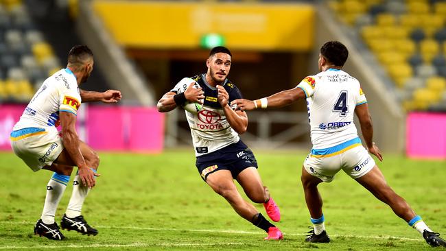 Holmes showed some slick hands in North Queensland’s win over the Titans. Picture by Alix Sweeney.