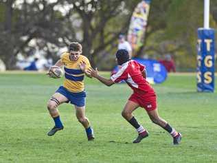 GOOD SPEED: Toowoomba Grammar School 2nd XV player Mitchell Bourke breaks through the Ipswich Grammar line. Picture: Kevin Farmer