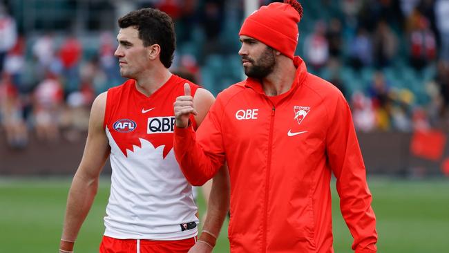 Paddy McCartin and his brother Tom after the win over Hawthorn in Hobart. Picture: Michael Willson/AFL Photos via Getty Images