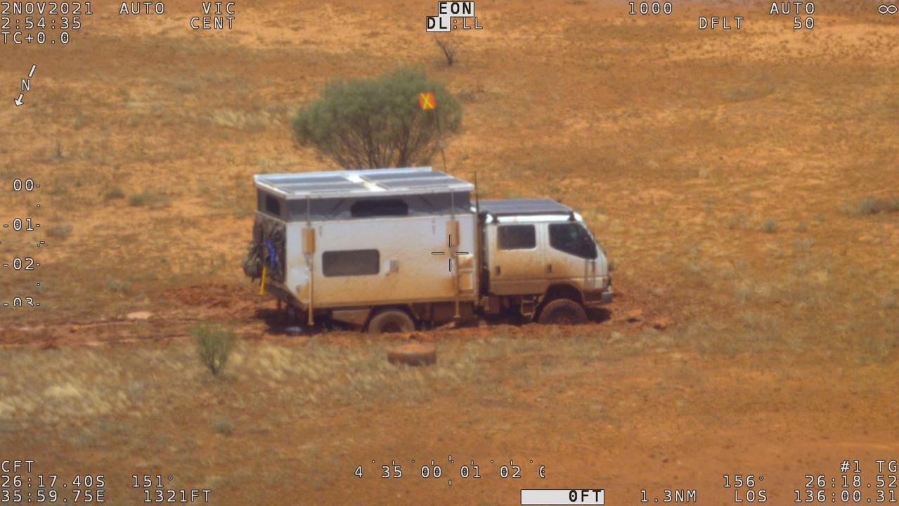The family is stuck in the mud. Picture: AFP