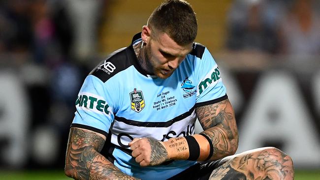 Josh Dugan of the Sharks celebrates after scoring a try.