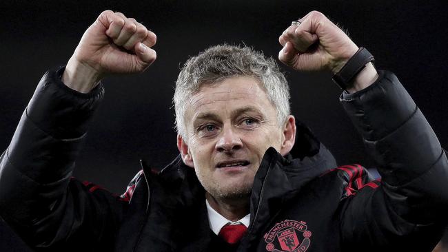 Manchester United manager Ole Gunnar Solskjaer celebrates at the Cardiff City Stadium