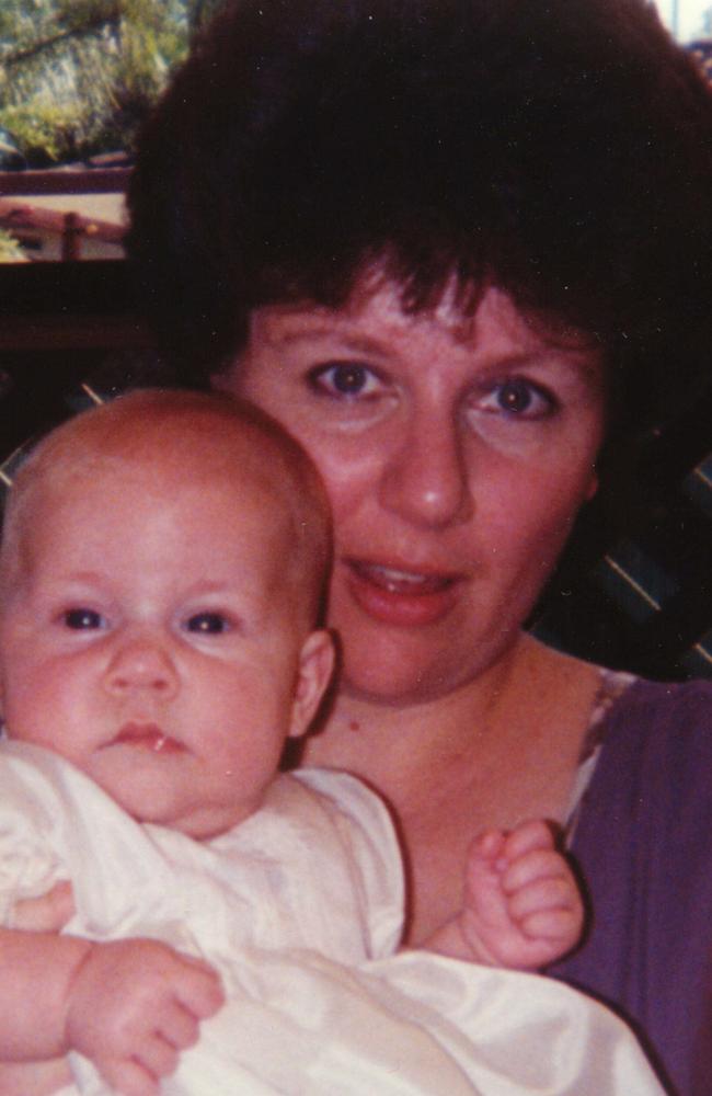 Ms Folbigg with her baby daughter Sarah at her naming ceremony. Sarah died 30 Aug 1993.