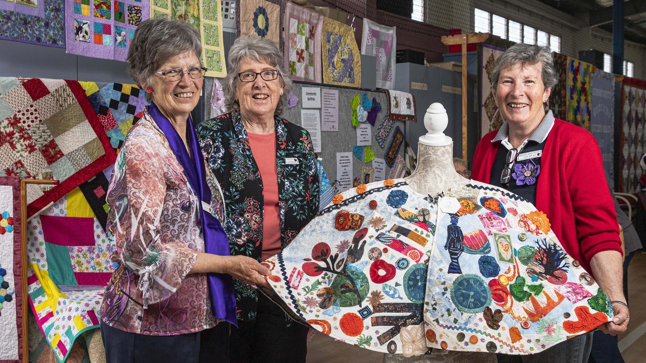 At the Toowoomba Quilters Club exhibition are members (from left) Janice Becker, Carol Bateman and Lee Hicks with an entry in the textile art challenge by Gail Johnson at Toowoomba Community Baptist Church, Thursday, September 19, 2024. Picture: Kevin Farmer