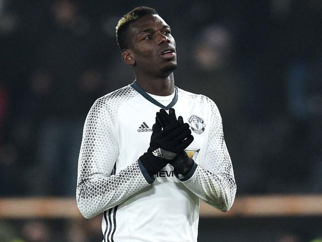 Manchester United's French midfielder Paul Pogba claps after winning the EFL (English Football League) Cup semi-final second-leg football match between Hull City and Manchester United at the KCOM Stadium in Kingston upon Hull, north east England on January 26, 2017. / AFP PHOTO / Oli SCARFF / RESTRICTED TO EDITORIAL USE. No use with unauthorized audio, video, data, fixture lists, club/league logos or 'live' services. Online in-match use limited to 75 images, no video emulation. No use in betting, games or single club/league/player publications. /