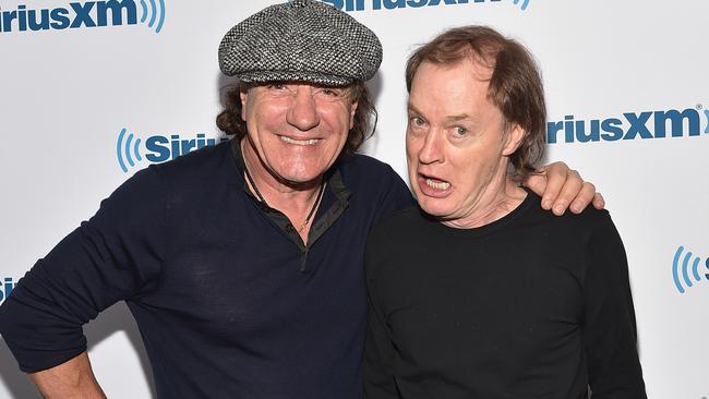 Punny guys ... Brian Johnson and Angus Young have been sharing laughs launching Rock or Bust. Picture: Mike Coppola / Getty Images