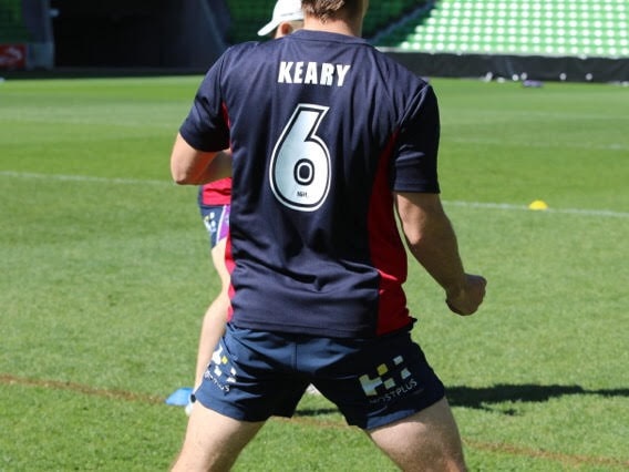 Melbourne Storm players dressed up as Sydney Roosters players at training for the grand final.