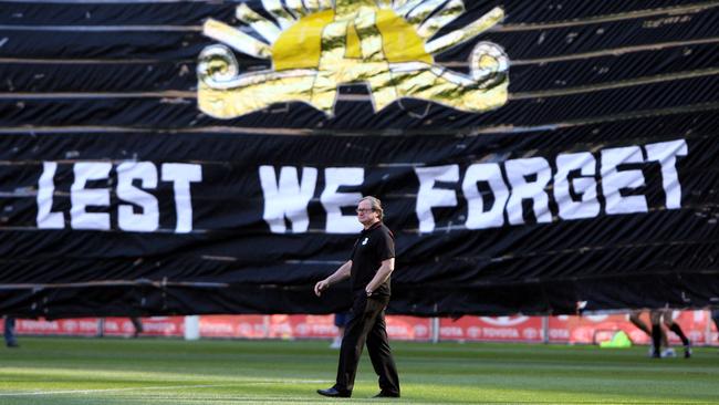 Essendon v Collingwood. Anzac Day. MCG. Kevin Sheedy infront of the Collingwood banner.