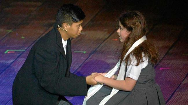 A touching moment between the Escapologist (Benedict Wright) and Matilda (Ella Plumb). Picture: Jann Houley