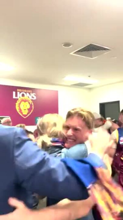 Brisbane Lions celebrate with Jonathan Brown