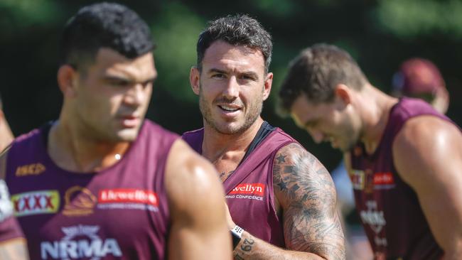 Darius Boyd keeps a close watch on in-demand teammate David Fifita at Broncos training. Picture: AAP Image/Glenn Hunt