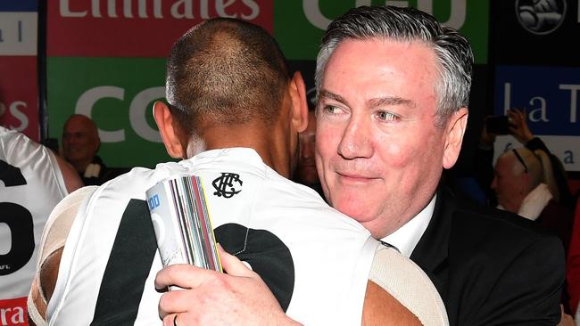 President of the Collingwood Eddie McGuire (right) embraces Travis Varcoe of the Magpies after the First Preliminary Final between the Richmond Tigers and the Collingwood Magpies in Week 3 of the AFL Finals Series at the MCG in Melbourne, Friday, September 21, 2018. (AAP Image/Julian Smith) NO ARCHIVING, EDITORIAL USE ONLY