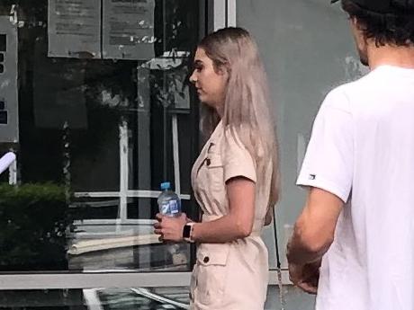 Hayley Trotter, 20, of Umina Beach, lining up to get into Gosford Local Court where she pleaded guilty to affray. Picture: supplied